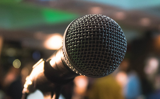a microphone in front of a crowd