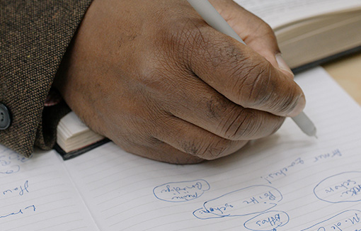 a student creating an argument map of literature