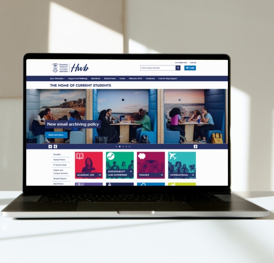 Open laptop with the MyUni website displayed