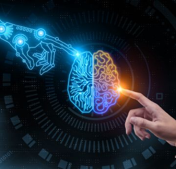 Deptiction of computer hand touching human hand