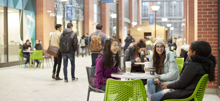 Students sitting outside Coffeopolis