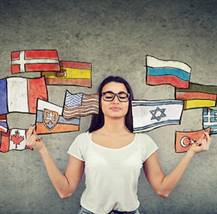 Woman surrounded by national flags