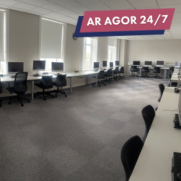 A PC lab with multiple pcs in the Nanhyfer building on Swansea University's Bay Campus