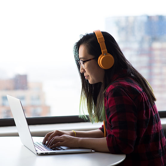 Student searching on computer