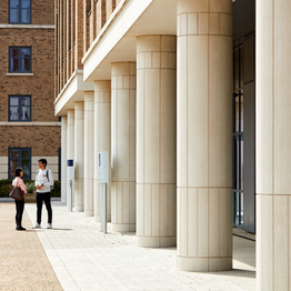 two students standing outside the computational foundry