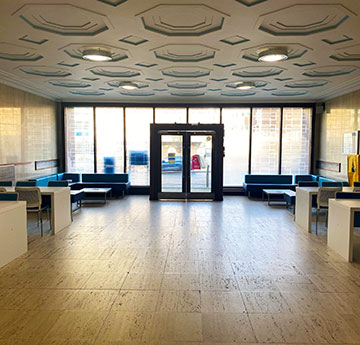 Wallace Building foyer - view of student seating area looking out onto the front doorway